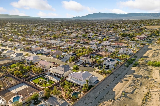 6999 Stone Meadows Ave, Las Vegas, NV 89142 - aerial view of property's location with a mountain backdrop and nearby suburban area