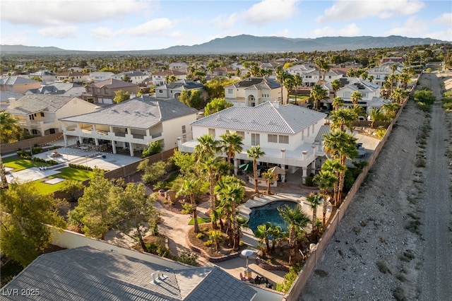 6999 Stone Meadows Ave, Las Vegas, NV 89142 - aerial perspective of suburban area featuring mountains and a pool
