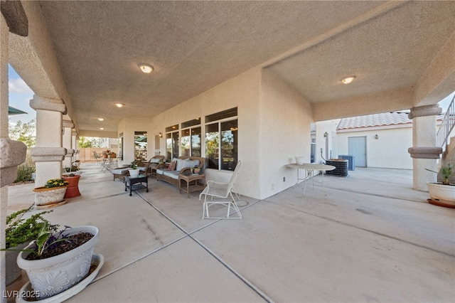 6999 Stone Meadows Ave, Las Vegas, NV 89142 - view of patio / terrace featuring outdoor lounge area