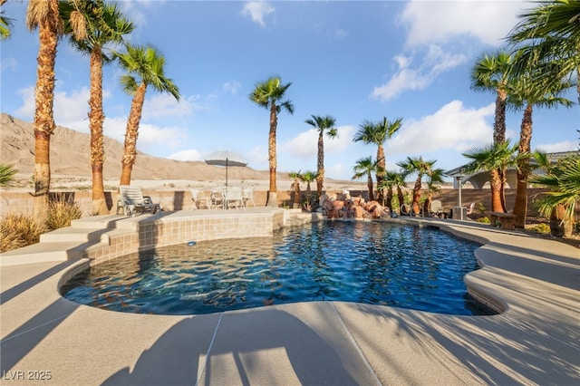6999 Stone Meadows Ave, Las Vegas, NV 89142 - outdoor pool featuring a mountain view and a patio