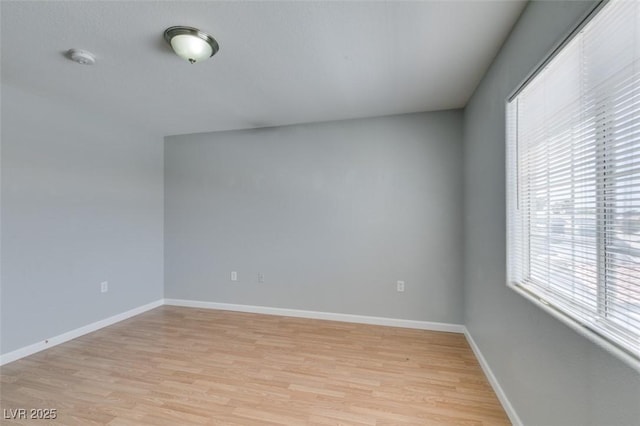 3318 N Decatur Blvd Unit 2110, Las Vegas, NV 89130 - spare room with plenty of natural light, light wood-type flooring, baseboards, and a smoke detector