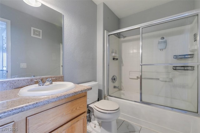 3318 N Decatur Blvd Unit 2110, Las Vegas, NV 89130 - bathroom with vanity, toilet, and bath / shower combo with glass door