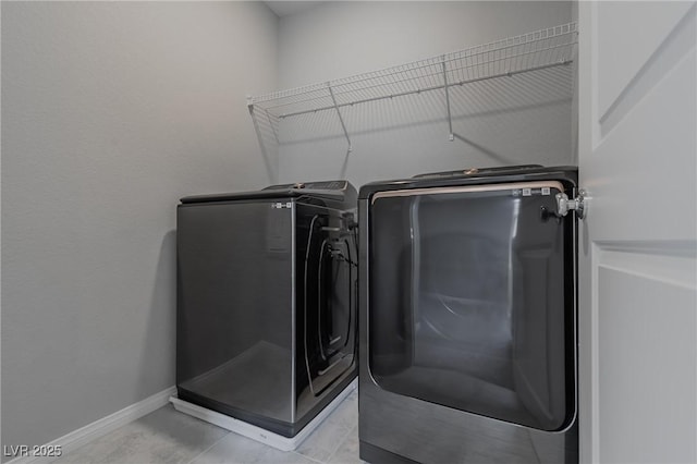 4589 Swimming Minnow Ave, Las Vegas, NV 89141 - laundry room featuring washing machine and dryer and baseboards