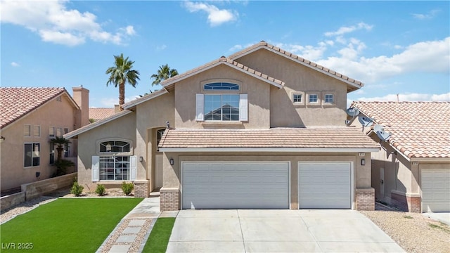 8714 Las Posas Ave, Las Vegas, NV 89147 - view of front facade with stucco siding, driveway, a garage, a front lawn, and brick siding