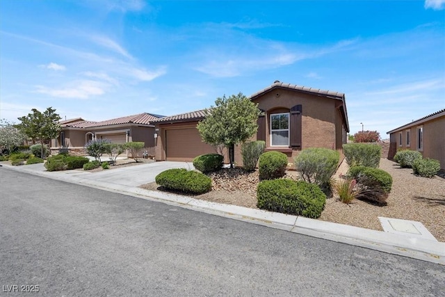 7428 Alamo Ranch Ave, Las Vegas, NV 89179 - mediterranean / spanish home featuring a tile roof, an attached garage, stucco siding, and driveway