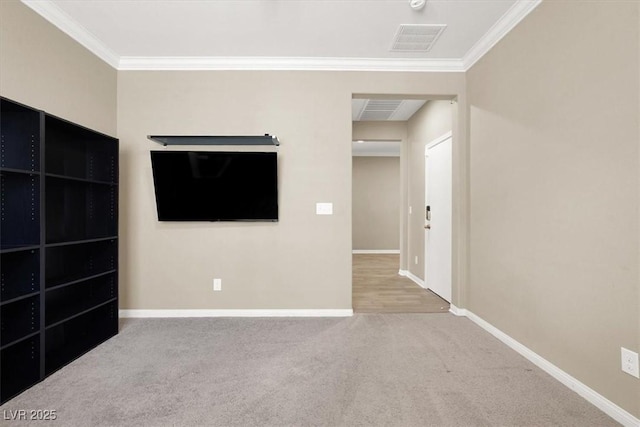 7428 Alamo Ranch Ave, Las Vegas, NV 89179 - unfurnished living room with crown molding, baseboards, and carpet flooring