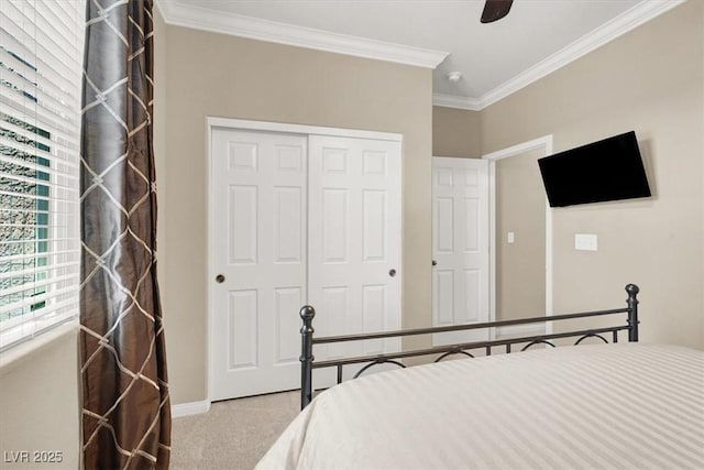 7428 Alamo Ranch Ave, Las Vegas, NV 89179 - bedroom with carpet, a closet, ornamental molding, baseboards, and ceiling fan