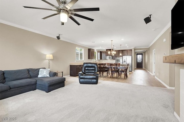7428 Alamo Ranch Ave, Las Vegas, NV 89179 - living room featuring crown molding, light colored carpet, baseboards, ceiling fan, and recessed lighting