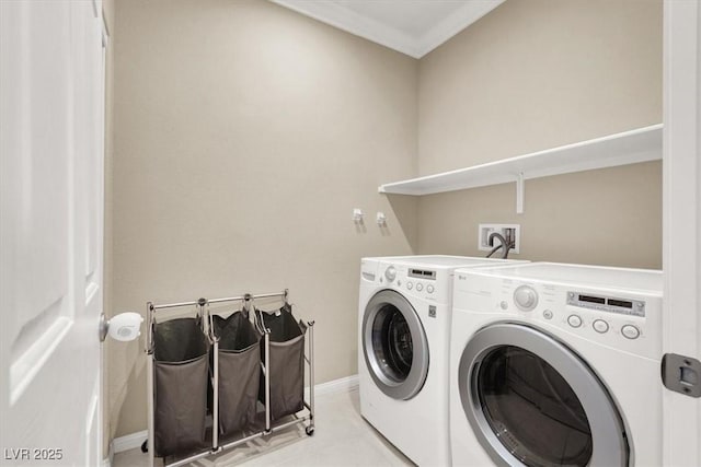 7428 Alamo Ranch Ave, Las Vegas, NV 89179 - laundry room featuring separate washer and dryer and baseboards