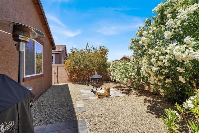 7428 Alamo Ranch Ave, Las Vegas, NV 89179 - fenced backyard featuring a patio area
