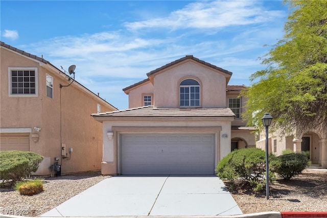 4149 Dignified Ct, North Las Vegas, NV 89032 - view of front of property with concrete driveway, stucco siding, a garage, and a tile roof