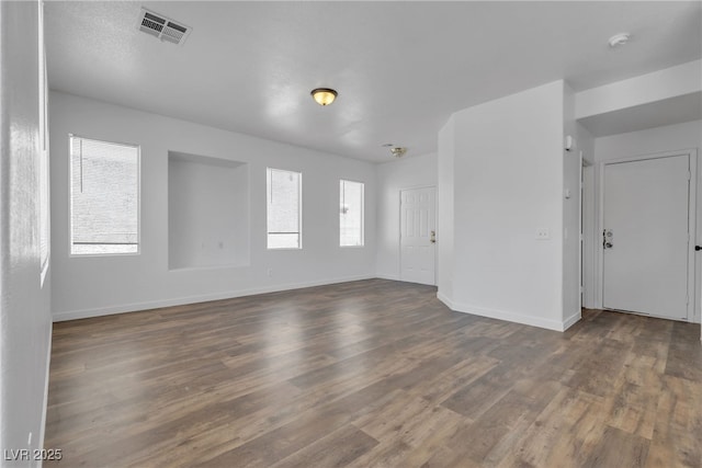 4149 Dignified Ct, North Las Vegas, NV 89032 - spare room with dark wood finished floors, a smoke detector, and baseboards