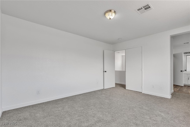 4149 Dignified Ct, North Las Vegas, NV 89032 - unfurnished bedroom with baseboards, carpet floors, and a closet