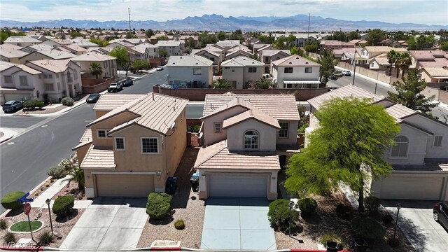 4149 Dignified Ct, North Las Vegas, NV 89032 - aerial view of residential area with a mountain backdrop