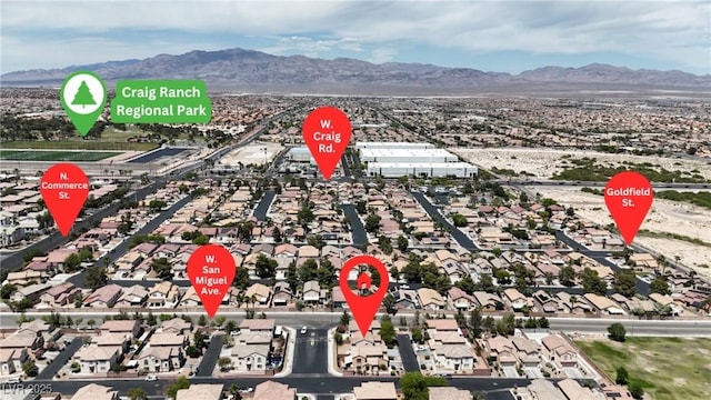 4149 Dignified Ct, North Las Vegas, NV 89032 - aerial view of residential area with mountains