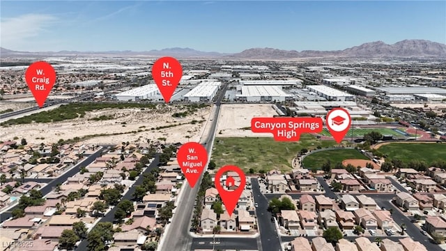 4149 Dignified Ct, North Las Vegas, NV 89032 - aerial perspective of suburban area featuring mountains
