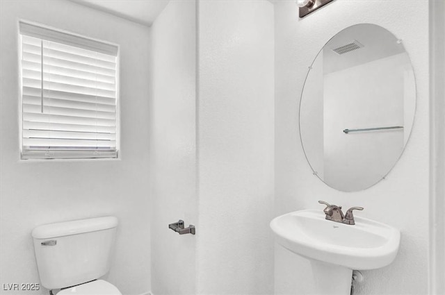 10230 Viterbo St, Las Vegas, NV 89183 - half bathroom with a sink and toilet