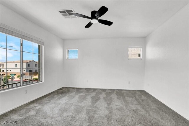 10230 Viterbo St, Las Vegas, NV 89183 - spare room with carpet, ceiling fan, and baseboards