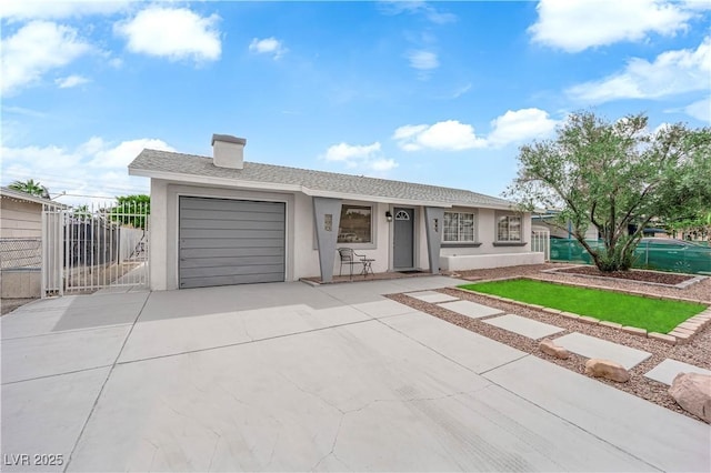721 Carpenter Dr, Las Vegas, NV 89107 - ranch-style house featuring concrete driveway, stucco siding, a garage, and fence