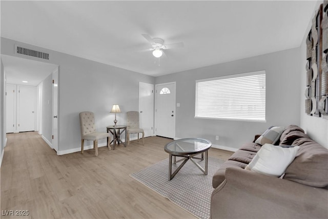 721 Carpenter Dr, Las Vegas, NV 89107 - living area featuring ceiling fan, light wood-style floors, and baseboards