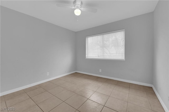 721 Carpenter Dr, Las Vegas, NV 89107 - unfurnished room featuring tile patterned flooring, ceiling fan, and baseboards