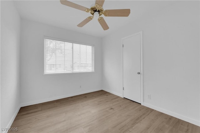 721 Carpenter Dr, Las Vegas, NV 89107 - empty room featuring wood finished floors, baseboards, and a ceiling fan