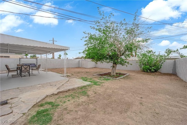 721 Carpenter Dr, Las Vegas, NV 89107 - fenced backyard with a patio