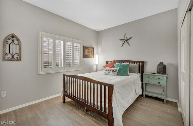 8501 W University Ave Unit 1083, Las Vegas, NV 89147 - bedroom featuring wood finished floors and baseboards