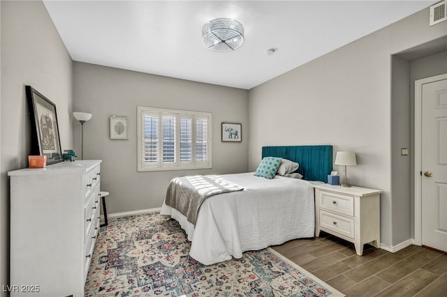 8501 W University Ave Unit 1083, Las Vegas, NV 89147 - bedroom with baseboards and wood finished floors