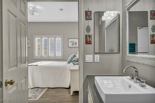 8501 W University Ave Unit 1083, Las Vegas, NV 89147 - bathroom with a sink and wood finished floors
