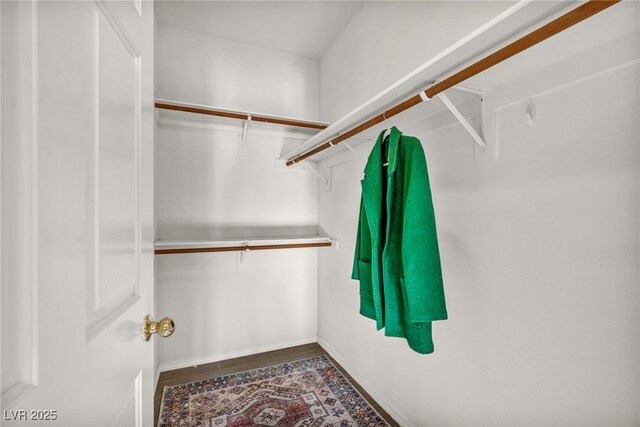 8501 W University Ave Unit 1083, Las Vegas, NV 89147 - walk in closet featuring wood finished floors
