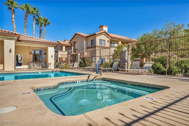 8501 W University Ave Unit 1083, Las Vegas, NV 89147 - community pool featuring a patio area