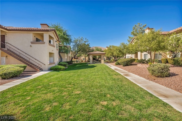 8501 W University Ave Unit 1083, Las Vegas, NV 89147 - view of green lawn featuring a gazebo and stairs