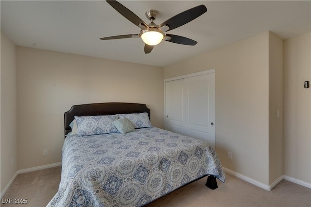5912 Kit Cove Ct, Las Vegas, NV 89131 - carpeted bedroom with baseboards, a closet, and a ceiling fan