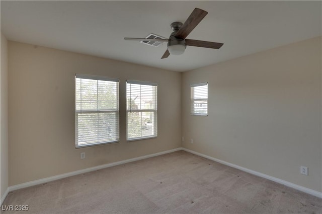 5912 Kit Cove Ct, Las Vegas, NV 89131 - unfurnished room with a ceiling fan, light carpet, and baseboards