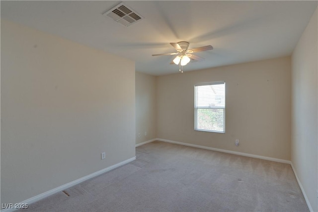 5912 Kit Cove Ct, Las Vegas, NV 89131 - spare room featuring light colored carpet, a ceiling fan, and baseboards