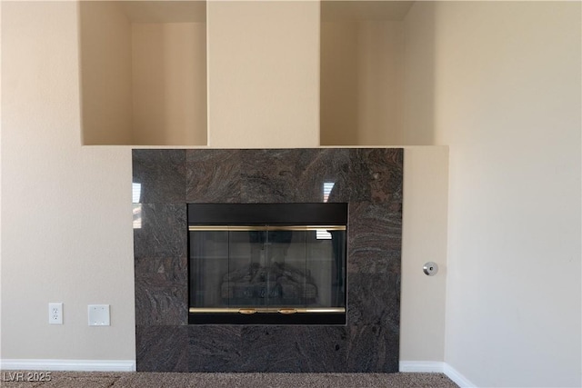 5912 Kit Cove Ct, Las Vegas, NV 89131 - detailed view of a tile fireplace, baseboards, and carpet floors