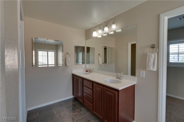 5912 Kit Cove Ct, Las Vegas, NV 89131 - bathroom with baseboards and double vanity