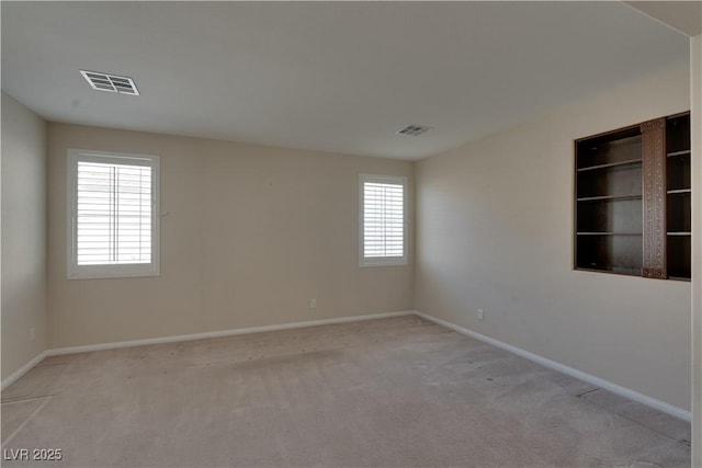 5912 Kit Cove Ct, Las Vegas, NV 89131 - spare room with plenty of natural light, light colored carpet, and baseboards