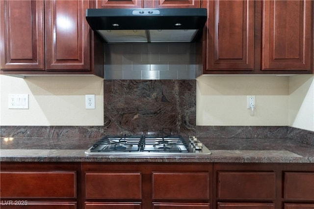 5912 Kit Cove Ct, Las Vegas, NV 89131 - kitchen featuring under cabinet range hood, tasteful backsplash, and stainless steel gas cooktop