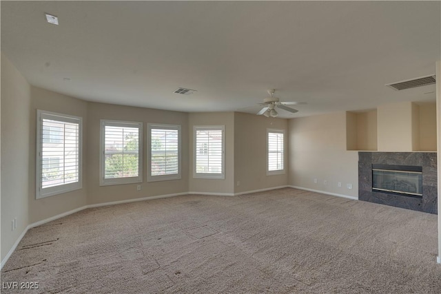 5912 Kit Cove Ct, Las Vegas, NV 89131 - unfurnished living room with baseboards, ceiling fan, a high end fireplace, and light colored carpet