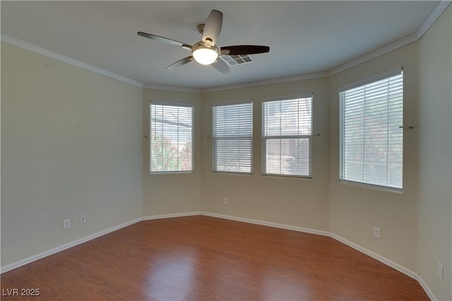 5912 Kit Cove Ct, Las Vegas, NV 89131 - spare room with ceiling fan, crown molding, wood finished floors, and baseboards