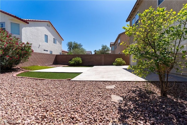 5912 Kit Cove Ct, Las Vegas, NV 89131 - fenced backyard with a patio