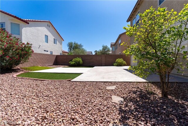 5912 Kit Cove Ct, Las Vegas, NV 89131 - fenced backyard featuring a patio