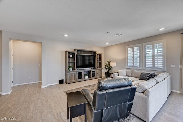 2902 Ventana Ridge Ave, Henderson, NV 89044 - living room with light wood-style flooring, baseboards, and recessed lighting