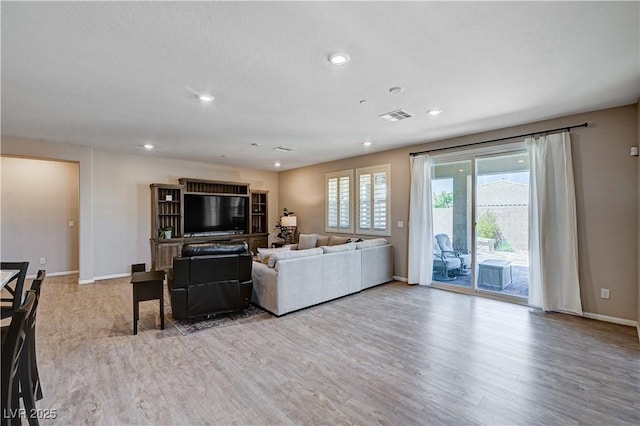 2902 Ventana Ridge Ave, Henderson, NV 89044 - living area featuring wood finished floors, baseboards, and recessed lighting