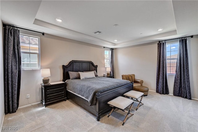 2902 Ventana Ridge Ave, Henderson, NV 89044 - bedroom featuring a raised ceiling, light colored carpet, multiple windows, and recessed lighting