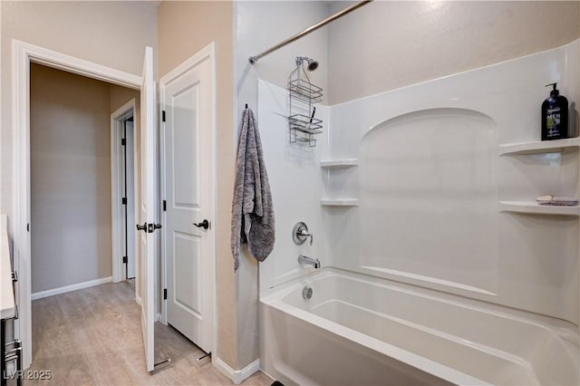 2902 Ventana Ridge Ave, Henderson, NV 89044 - full bath featuring wood finished floors, shower / bathtub combination, and baseboards