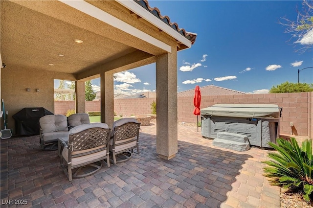 2902 Ventana Ridge Ave, Henderson, NV 89044 - view of patio / terrace with a fenced backyard, a grill, outdoor dining area, and a fire pit