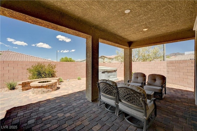 2902 Ventana Ridge Ave, Henderson, NV 89044 - view of patio featuring a fire pit and a fenced backyard